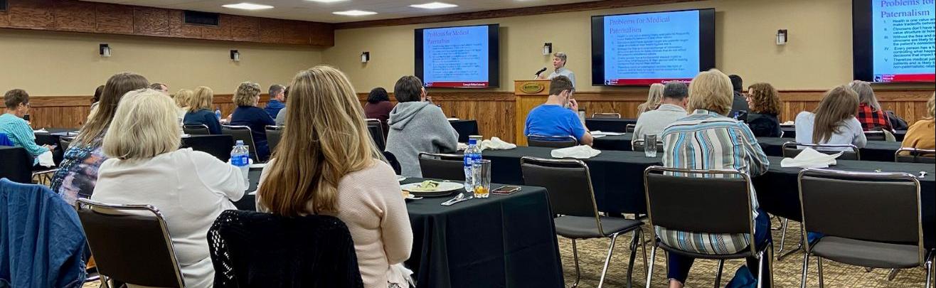 photo of adult learners at a symposium